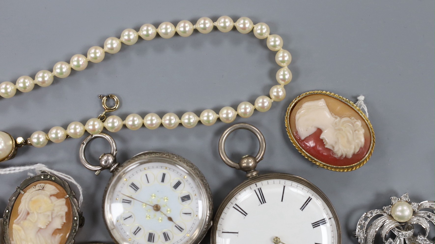 A mixed group of assorted silver and costume jewellery including a silver albert, Scottish hardstone brooch and two silver medallions, a silver fob watch, a white metal open faced pocket watch and a lady's steel Talis wr